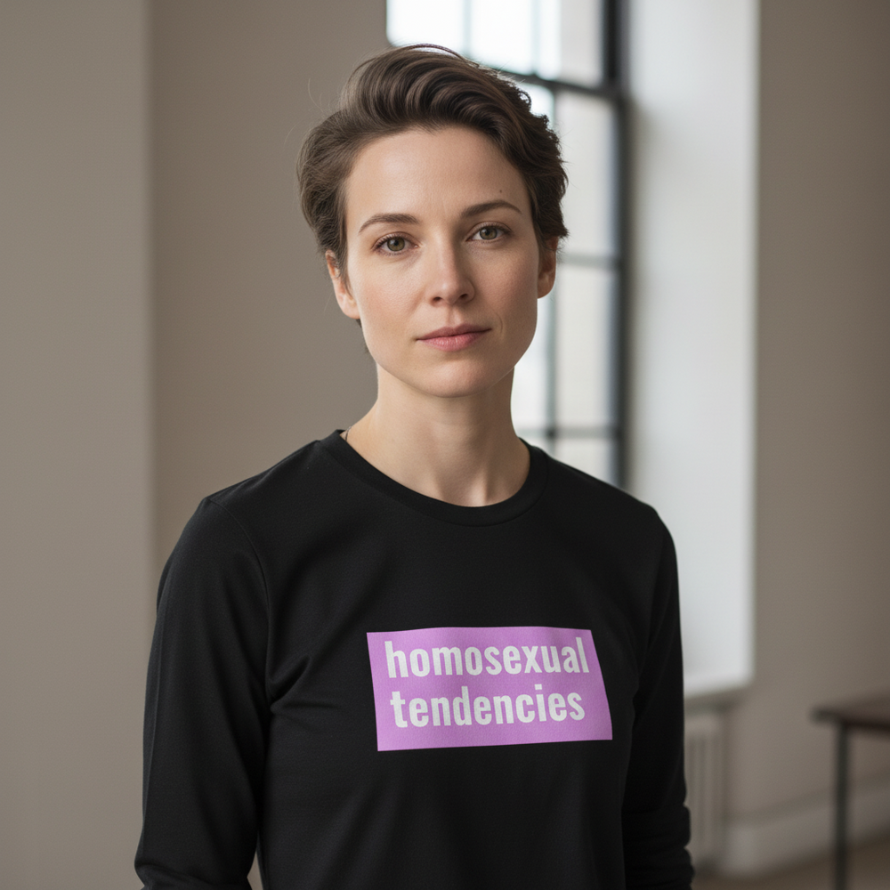 Homosexual Tendencies unisex black long sleeve tee with "homosexual tendencies" in white on a purple block