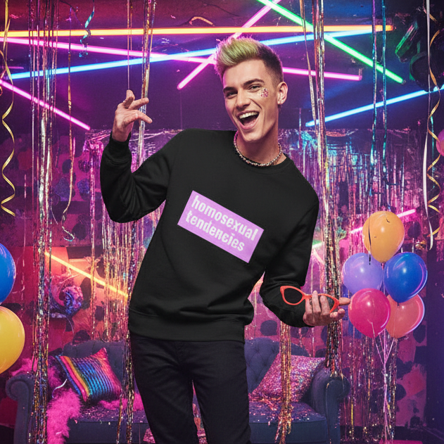 The Homosexual Tendencies Unisex Sweatshirt, bold text on cozy fabric, worn by a short-blonde queer in neon light