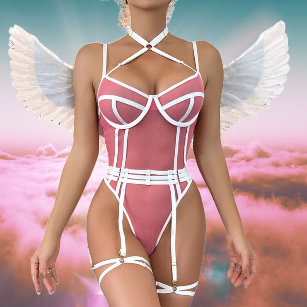 Front view of a model in pink-and-white strappy lingerie with garters and white angel wings