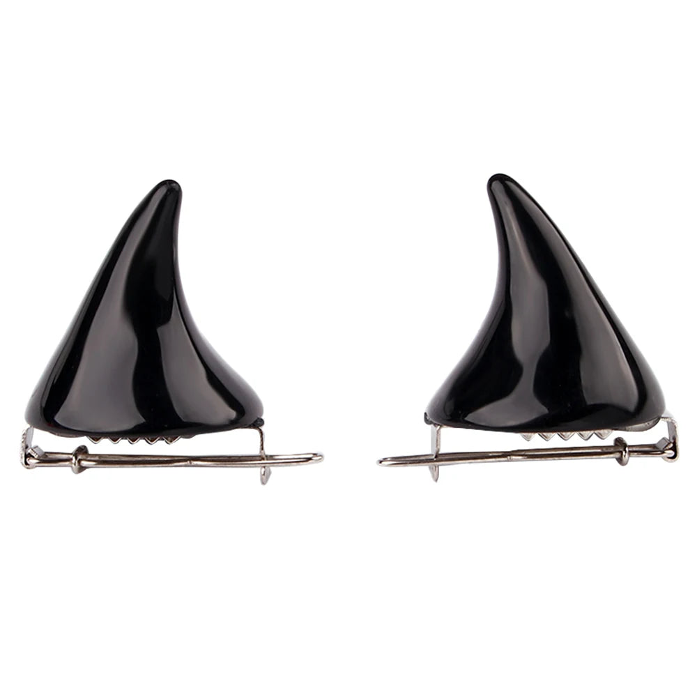 Pair of glossy black devil-horn hairpins shown from the front on a white background