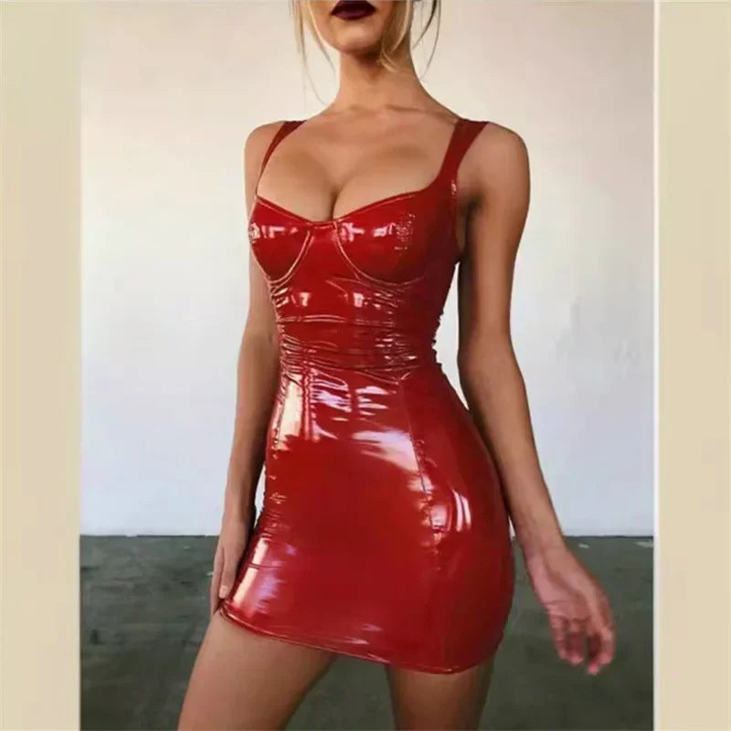 Cropped model wearing a glossy red latex mini-dress with structured cups