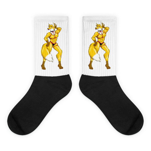 Pair of black-and-white crew socks featuring matching yellow furry characters in red briefs