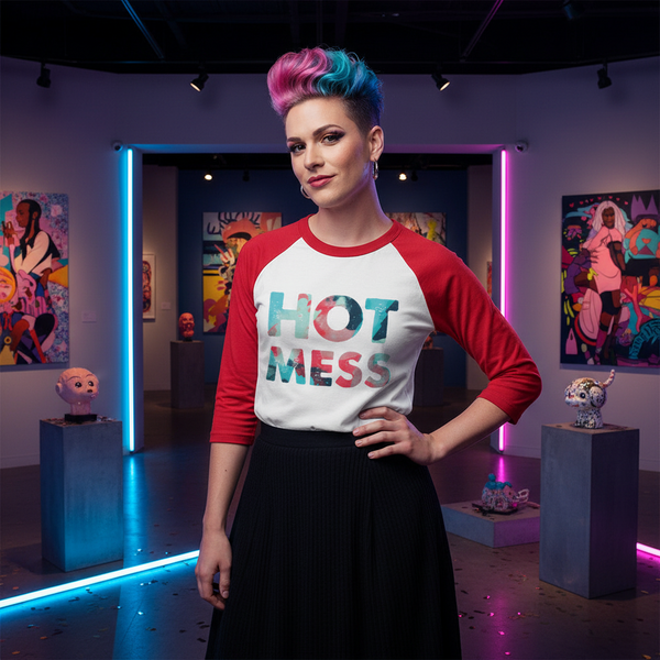 Hot Mess 3/4 Sleeve Raglan Shirt on a confident person with pink and blue hair in a neon-lit, art-filled queer gallery space.