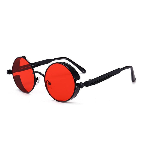 Angled view of round black sunglasses with vivid red lenses and steampunk-style side details