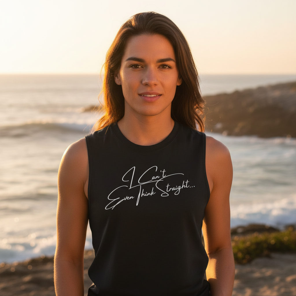I Can't Even Think Straight muscle top worn by a person with loose brown hair, standing beachside at sunset