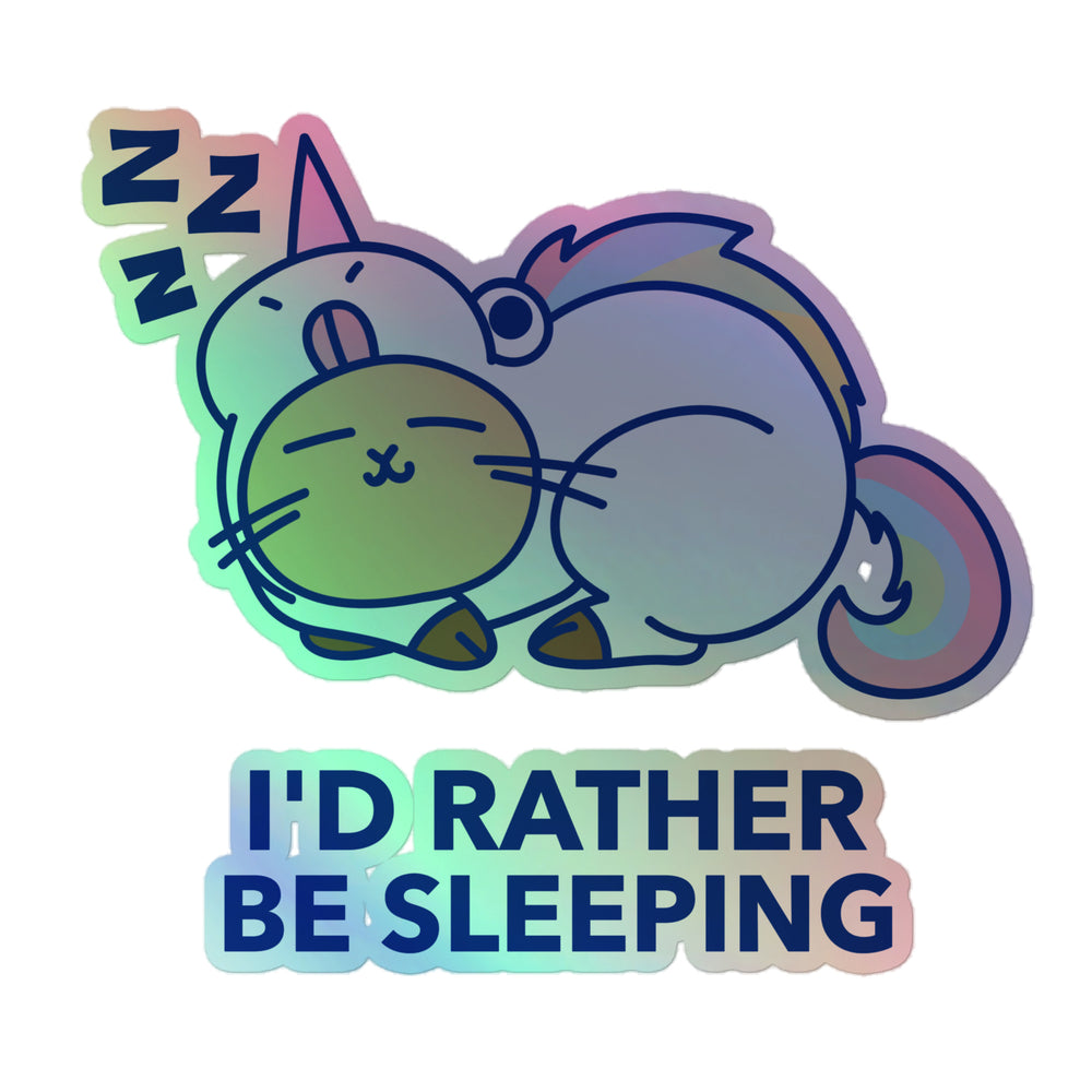 Holographic sticker of a sleeping cat with a rainbow tail and “I’D RATHER BE SLEEPING” text