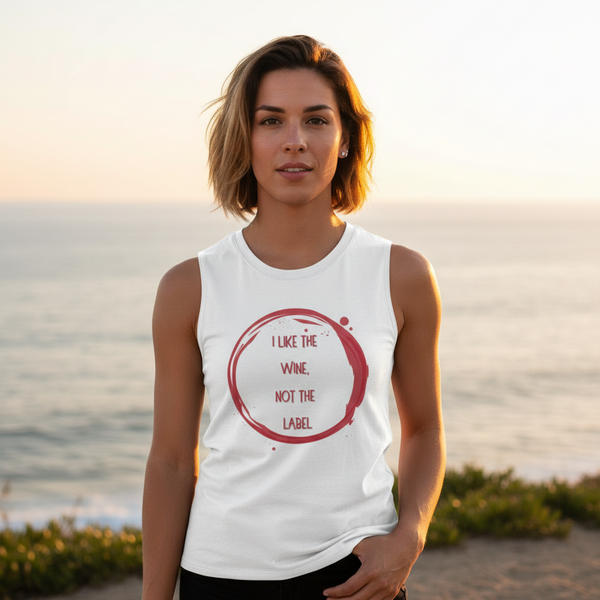 I Like The Wine Not The Label muscle top on a person with short brown hair, sunset by the ocean