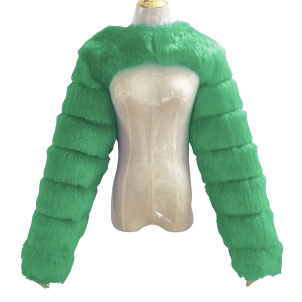 Green faux-fur cropped shawl jacket with voluminous segmented sleeves on a mannequin