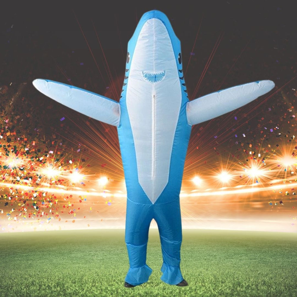 Inflatable blue shark costume with outstretched fins on a confetti-filled field