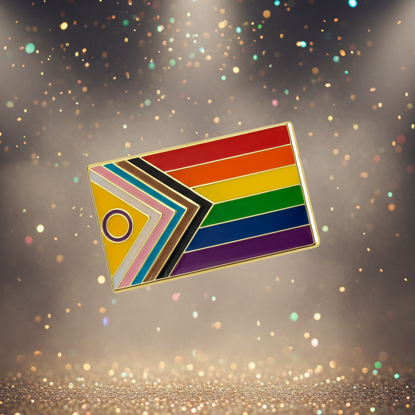 Intersex-inclusive Progress Pride enamel pin with rainbow stripes and chevron design