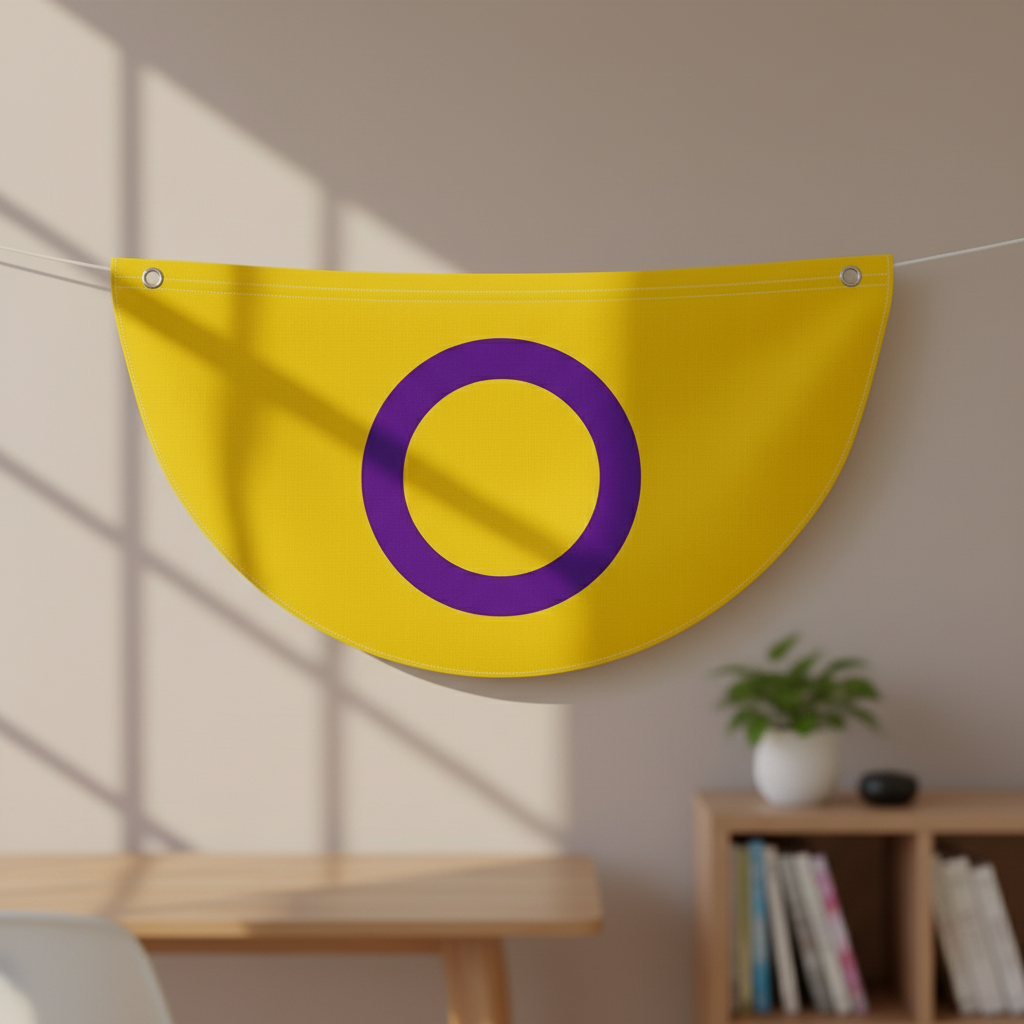 Yellow intersex pride bunting with a purple ring, hung indoors on a cord