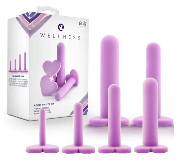 Four graduated pink-purple anal dilators with heart-shaped bases beside their retail box