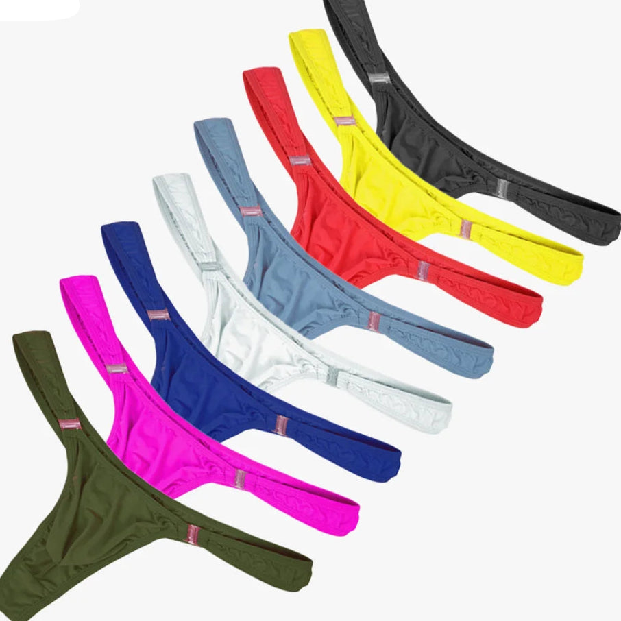 Fan of eight lace-trimmed thongs in black, yellow, red, blue, white, pink, and olive green