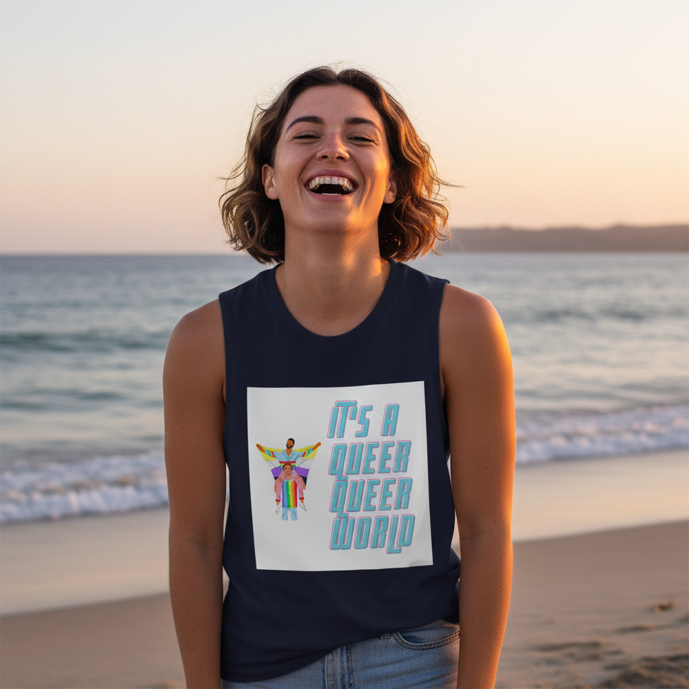 Muscle top with bold, vibrant “Its A Queer Queer World” slogan worn by a short-haired person at sunset beach
