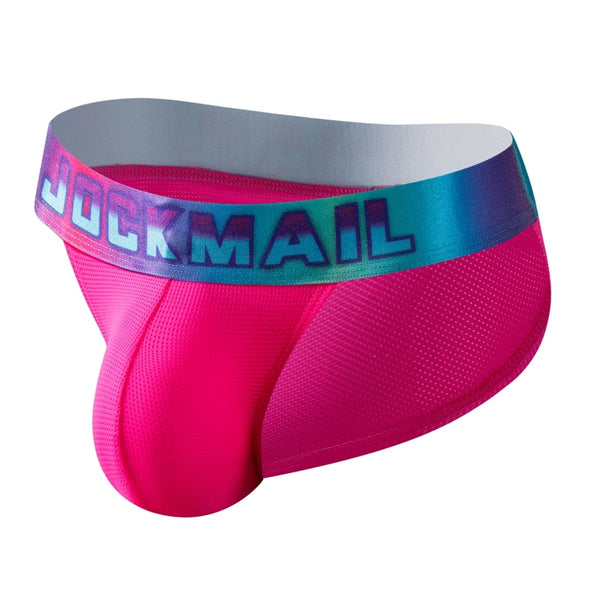 Front three-quarter view of hot-pink mesh briefs with a multicolor JOCKMAIL waistband