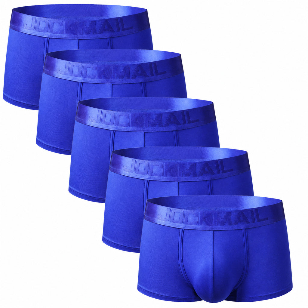 Five royal-blue Jockmail boxer briefs arranged diagonally on a white background