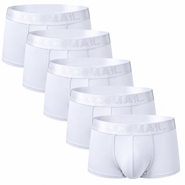 underwear for bears: Shirtless, muscular person with shaved head and beard models Jockmail Classic Boxers (5 Pack) by a dark