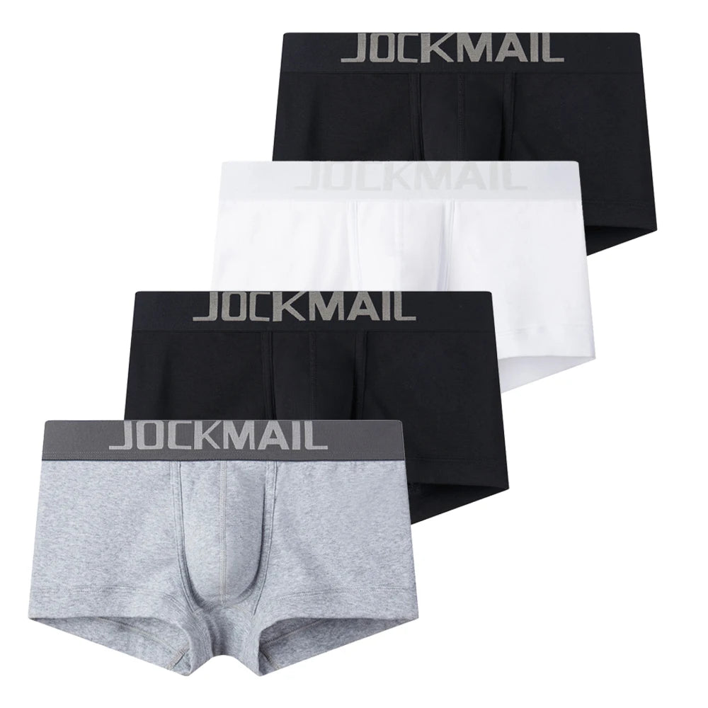 Four low-waist Jockmail boxer briefs in black, white, and gray with logo waistbands