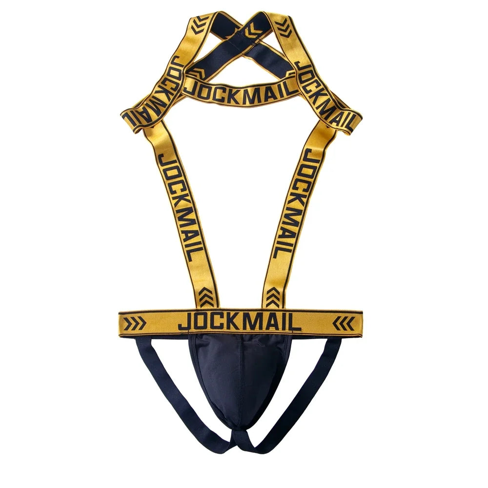 Flat-lay gold Jockmail-logo bodysuit and thong harness with a black pouch