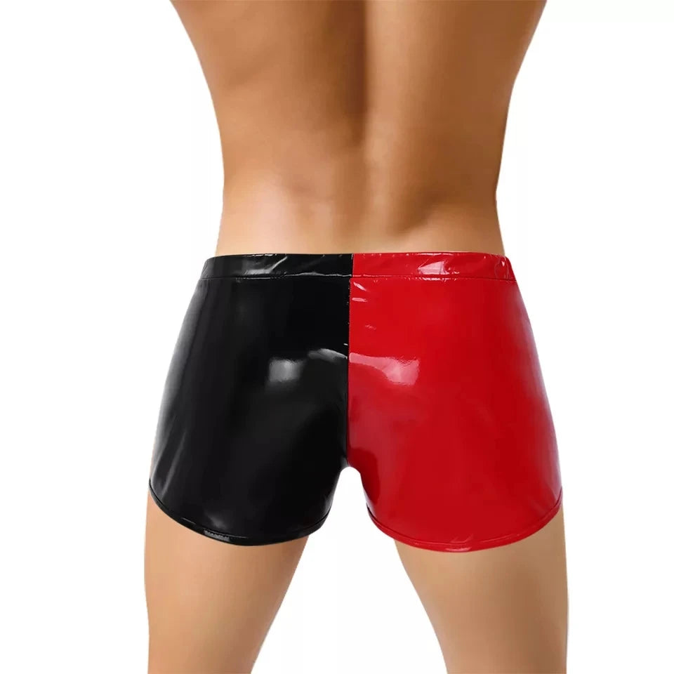 Model wearing glossy black-and-red split-color boxer underwear