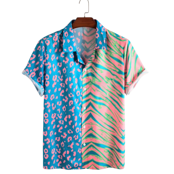 Front view of a short-sleeve camp-collar shirt split between blue leopard spots and pink chevrons