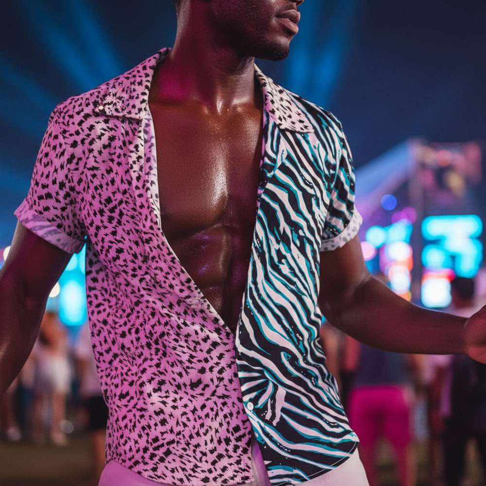 Cropped model wearing an open short-sleeve shirt split between pink leopard print and teal zebra stripes