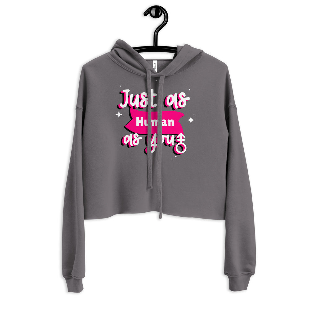 Front view of a charcoal cropped hoodie on a hanger, reading “Just as Human as You”