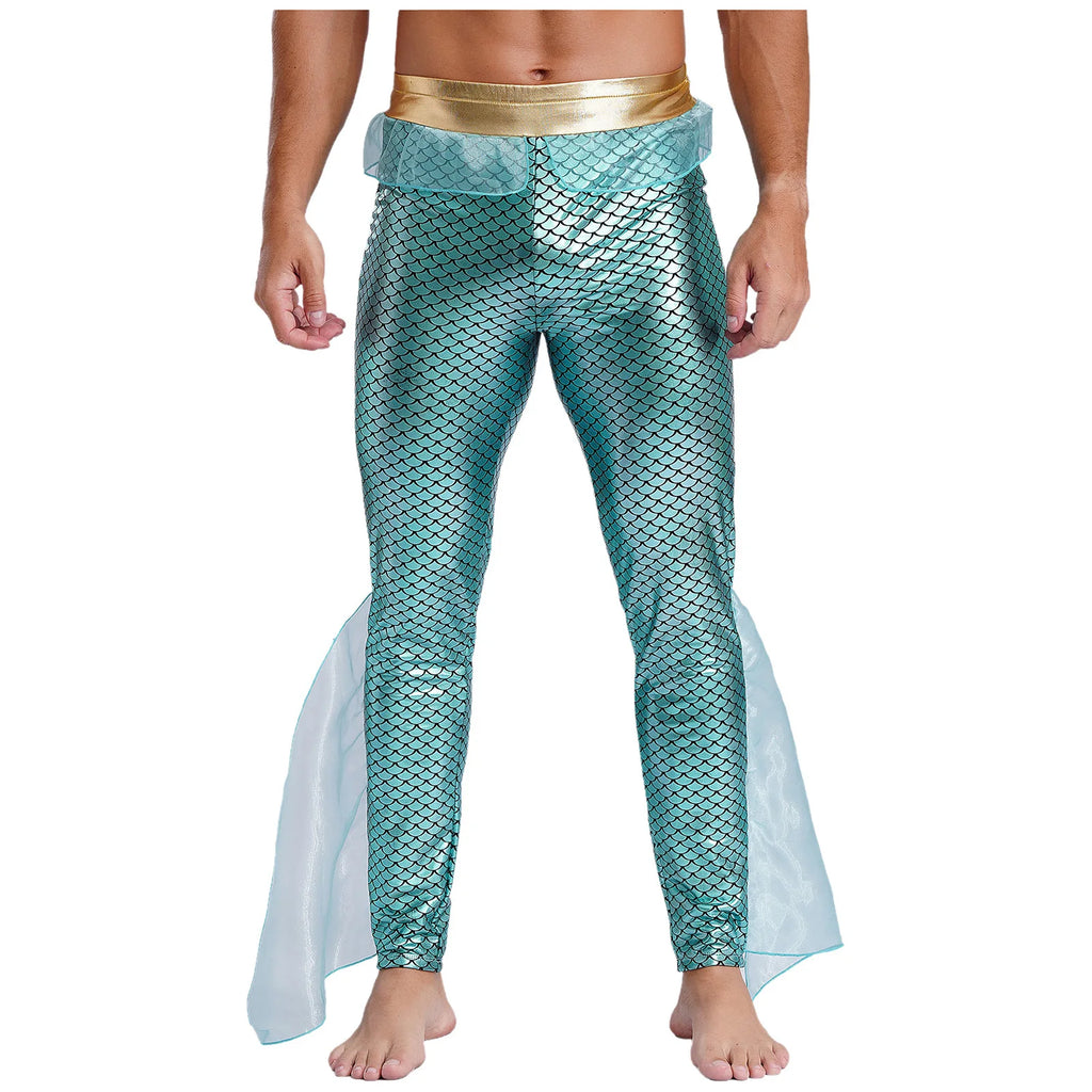 Front view of a model wearing turquoise mermaid-scale leggings with a gold waistband and fin panels