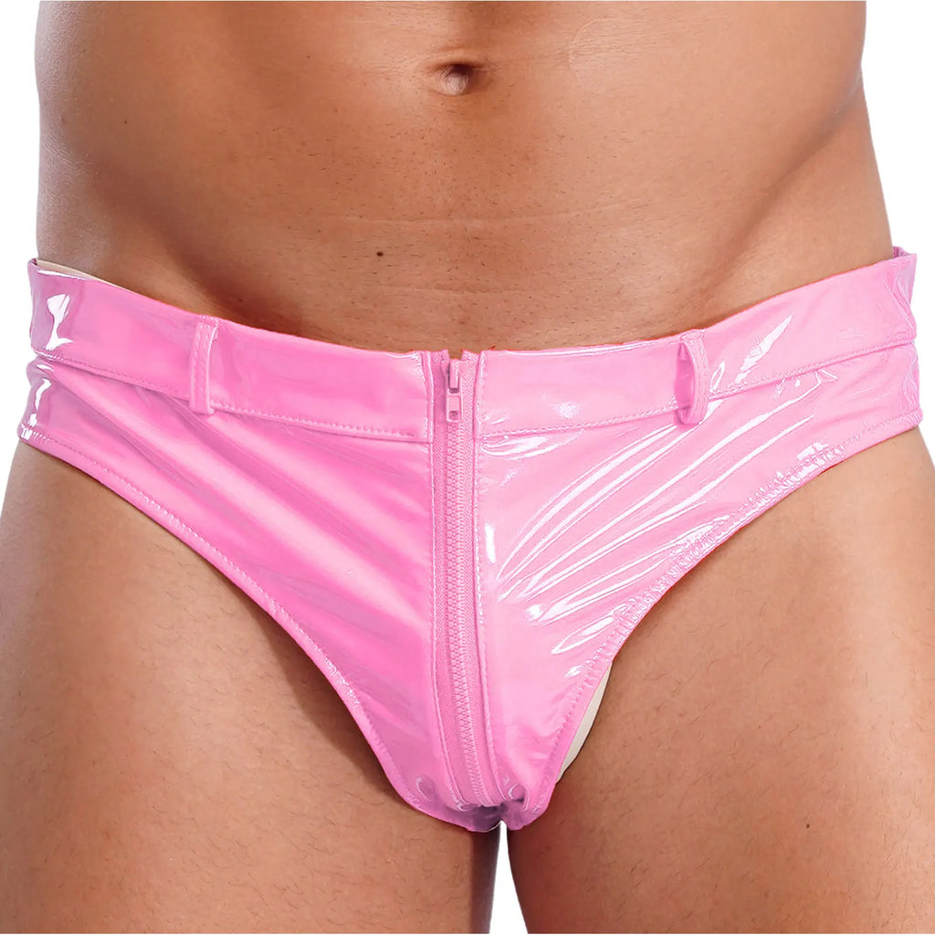 Close-up front view of a person wearing glossy pink vinyl fetish briefs with a front zipper.