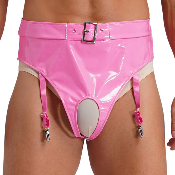 Front view of a model wearing glossy pink fetish briefs with a belt buckle, garter straps, and an open pouch