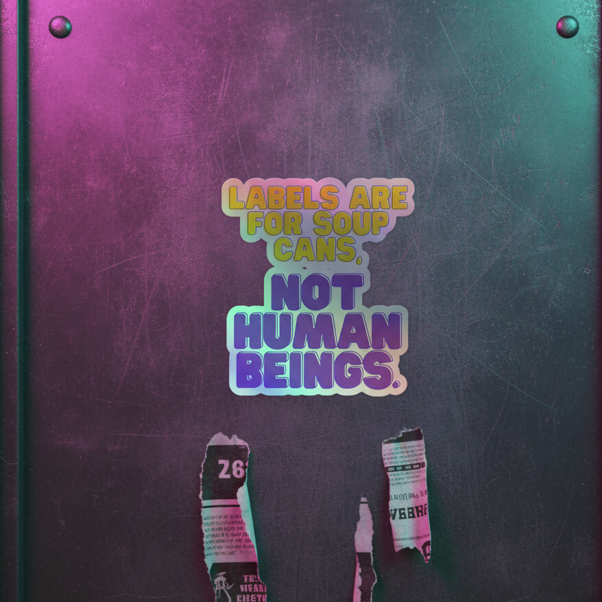 Labels Are For Soup Cans Holographic Sticker on shiny metal, lit with pink and green, reads: "Labels are for soup cans, not human beings." Torn paper and scratches below add a grungy queer vibe.