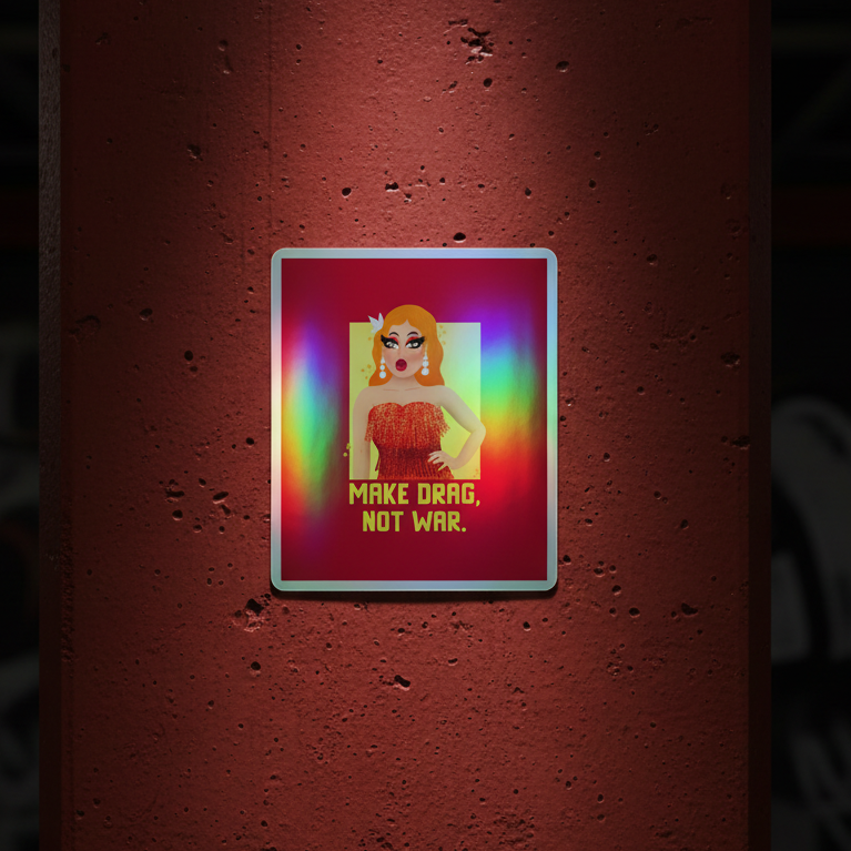 Holographic vinyl sticker with rainbow colors, a cartoon drag queen in a sparkling red dress, and text: “MAKE DRAG, NOT WAR.”.