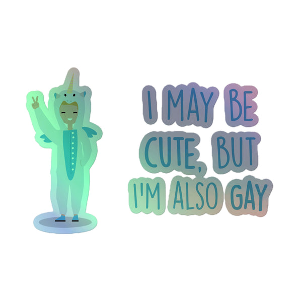 Cartoon character in unicorn onesie flashes peace sign beside “I MAY BE CUTE, BUT I’M ALSO GAY” slogan on Cute But Gay Holographic Stickers, celebrating queer pride with vibrant, durable vinyl.