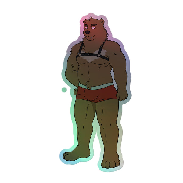 Gay Bear Holographic Stickers feature a muscular, anthropomorphic brown bear in red shorts and a leather harness, embodying bold self-expression and queer pride with an electrifying, rainbow shimmer.