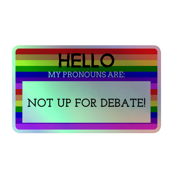 Hello My Pronouns Are Not Up For Debate Holographic Stickers feature a vibrant rainbow name tag design, exuding queer pride and empowerment. Crafted from durable vinyl, they shimmer with inclusivity and bold self-expression.