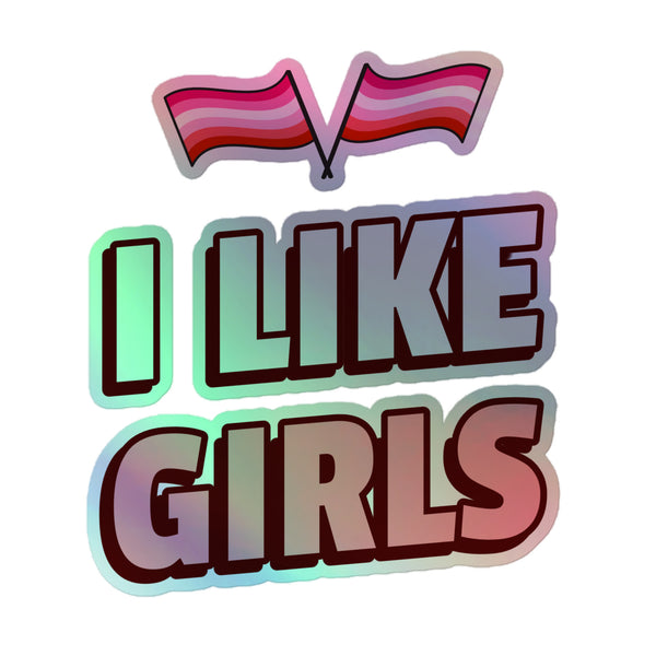 I Like Girls Holographic Stickers feature crossed 'lipstick lesbian' pride flags and bold block letters, embodying queer pride and self-expression with a vibrant, hot-embossed 3D design in durable vinyl.