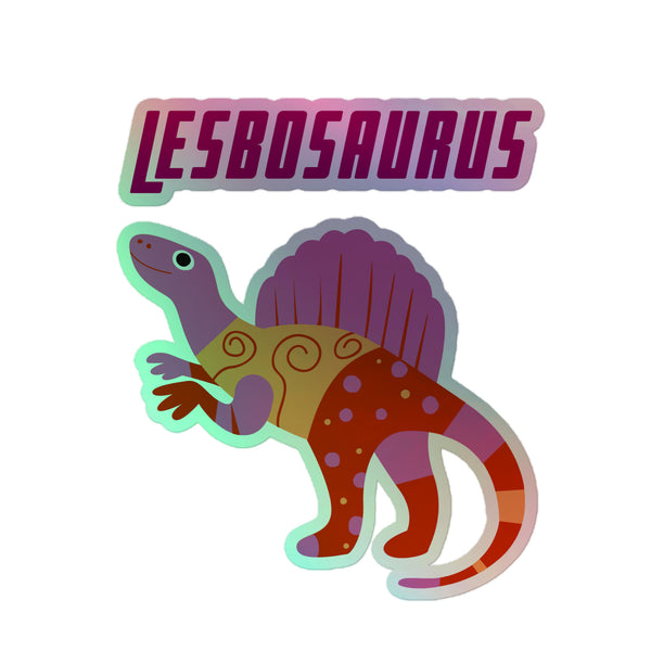 Lesbosaurus Holographic Stickers feature a vibrant, cartoonish dinosaur with a sail, accented by bold lettering. Crafted in durable vinyl, they celebrate queer pride with dazzling, rainbow shimmer and empowering visibility.