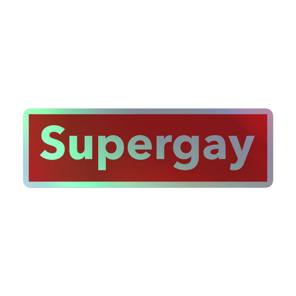 Supergay Holographic Stickers: A dynamic sticker featuring bold Supergay text on a deep red background, adorned with a subtle iridescent border, encapsulating queer pride and vibrant self-expression.