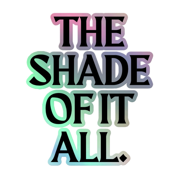 Stylized text THE SHADE OF IT ALL in bold black with a subtle multicolored gradient outline, featured on The Shade Of It All Holographic Stickers, celebrating queer pride and individuality.