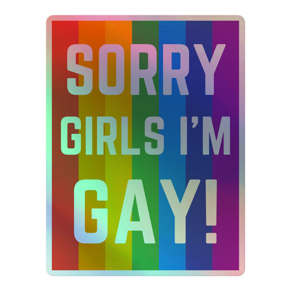 Sorry Girls I'm Gay! Holographic Sticker with vibrant rainbow stripes, bold lettering, and a deep 3D pattern, celebrating queer pride and identity with empowering self-expression. Made from durable vinyl for indoor use.