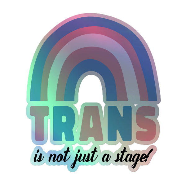 Stylized rainbow graphic in pastel hues with bold TRANS text and is not just a stage! script, illustrating the Trans Is Not Just A Stage! Holographic Stickers celebrating queer pride and self-expression.