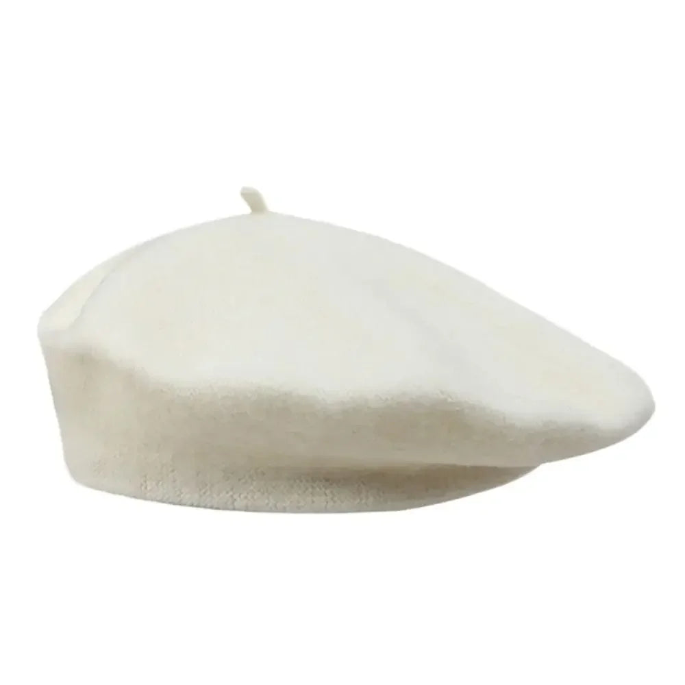 La femme elegant beret photographed in a side view.