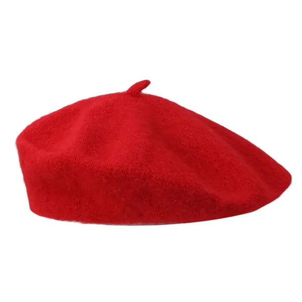 Red wool beret with a small top stem, shown against a white background