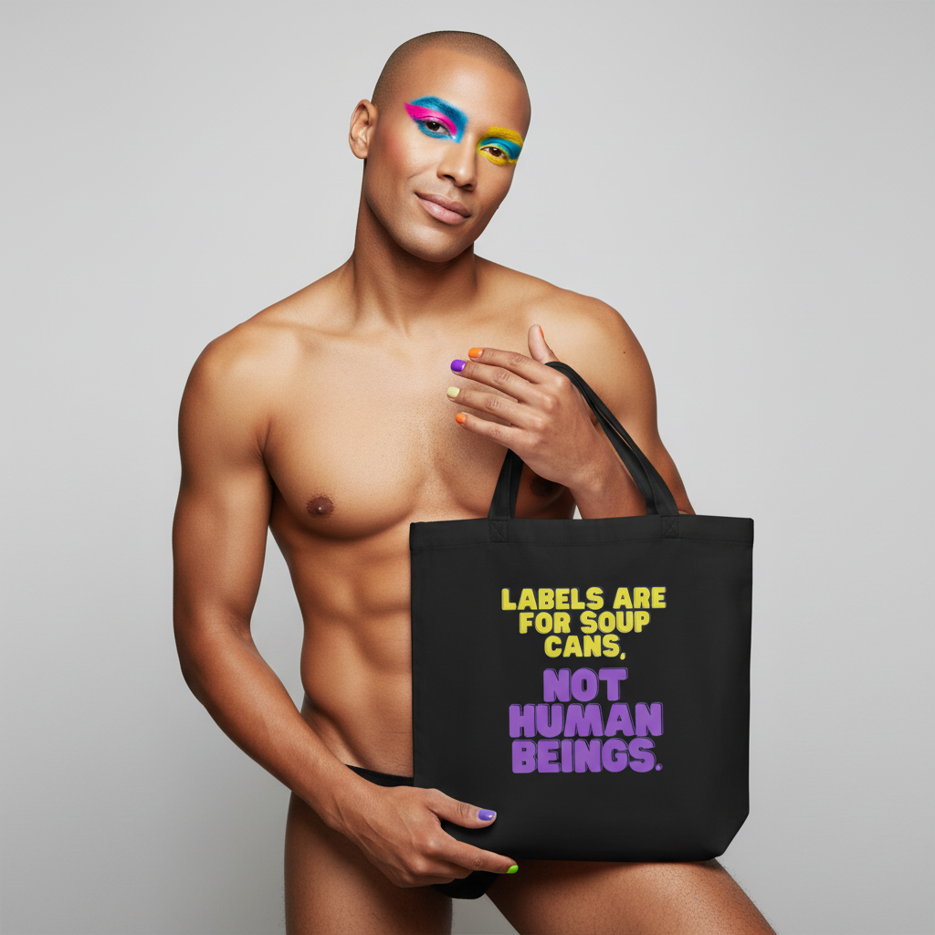 Eco tote bag reading "Labels are for soup cans, not human beings," held by a confident person with bold makeup and nails