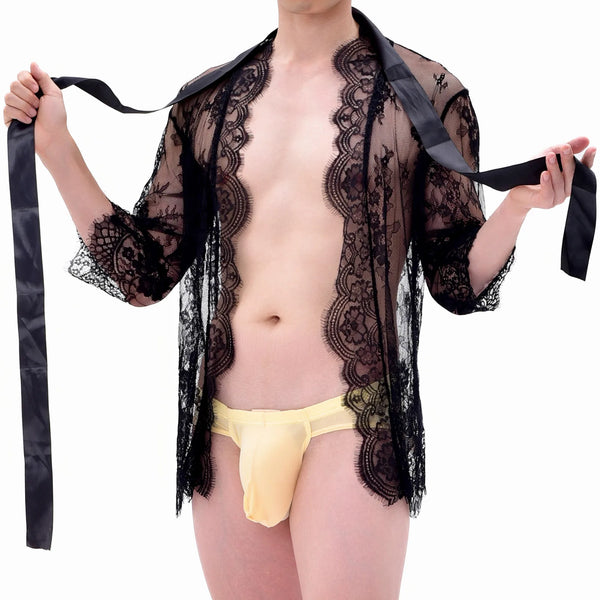 Front view of a person wearing a sheer black lace kimono over a yellow thong