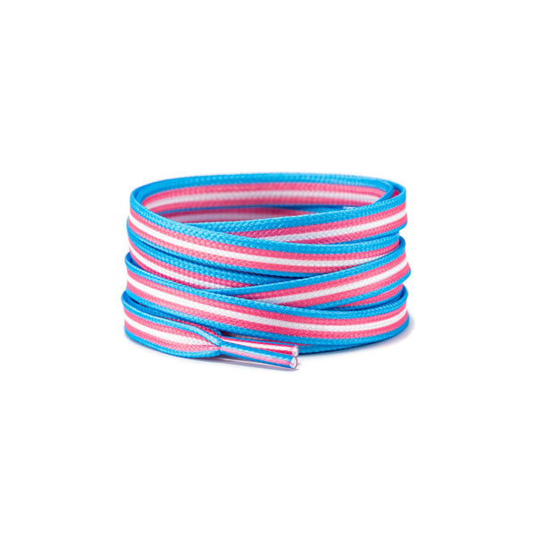 Coiled blue, pink, and white striped shoelaces with capped ends on a white background