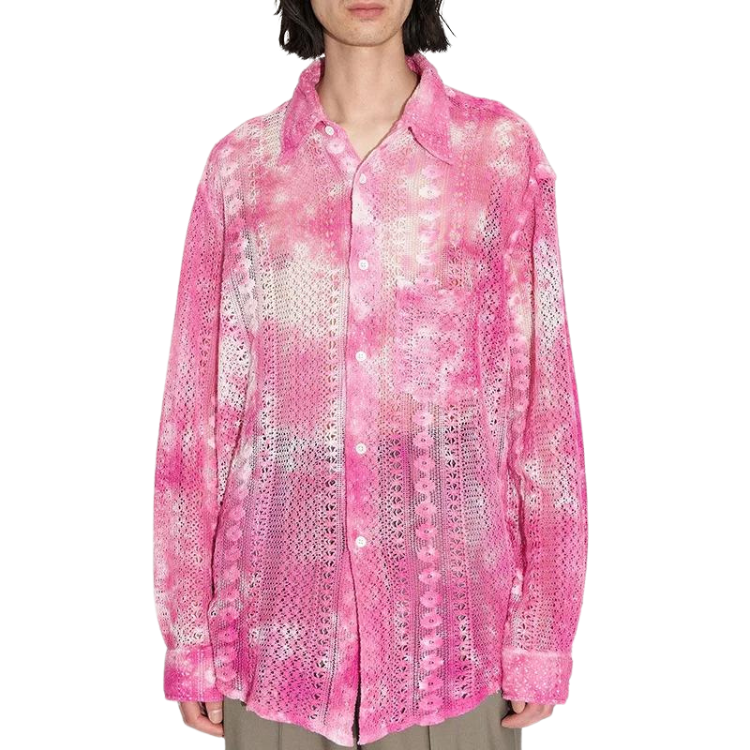 Front view of a model wearing a pink-and-white semi-sheer crochet button-up shirt