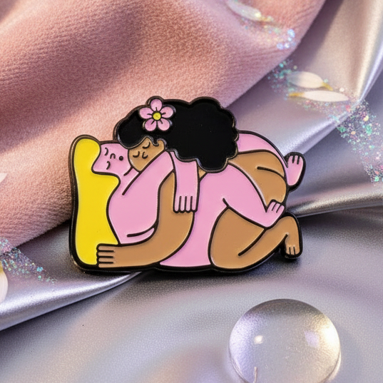 Flower Power Love enamel pin showing two people embracing, one with a pink flower in their hair