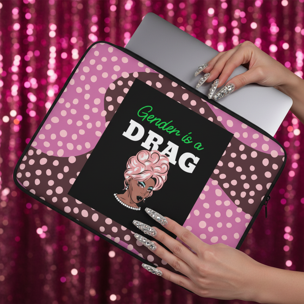 Gender Is A Drag Laptop Sleeve in pink sequin-style with polka dots, bold "Gender is a DRAG" and a glam drag queen; long sparkly nails.
