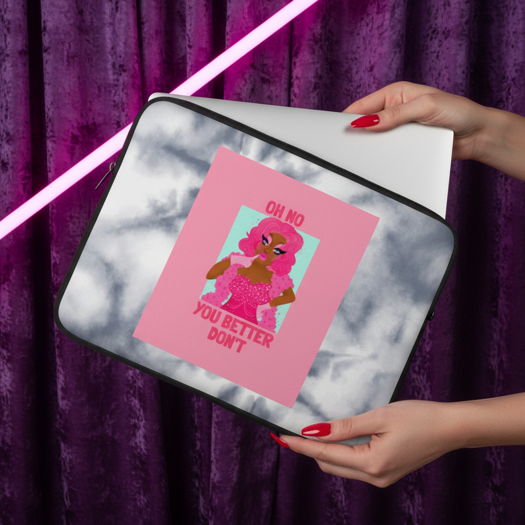 Oh No You Better Don't Laptop Sleeve—marble neoprene, pink borders, bold "OH NO YOU BETTER DONT," held by red-nailed hand. Neon-lit velvet backdrop.
